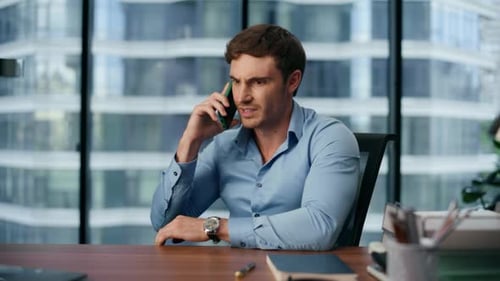 Upset Business Man Talking Phone Closeup. Angry Director Making Call In Luxury Place. Worried Exe...