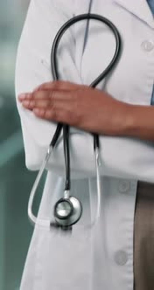 Doctor, hands and healthcare service with stethoscope for professional medical help in hospital