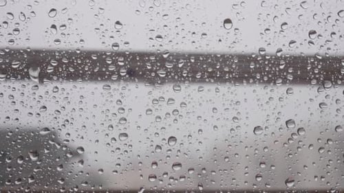 Rain Drops on a Window Close Up