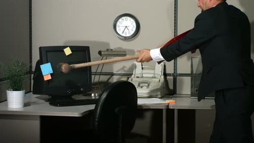 Businessman Smashing Computer,