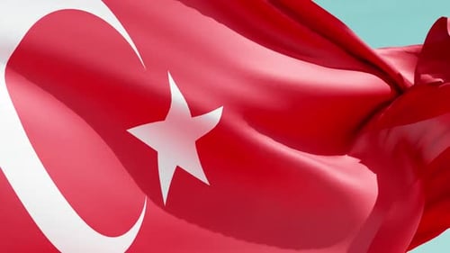 Realistic Turkish Flag Waving in the Wind with Blue Sky