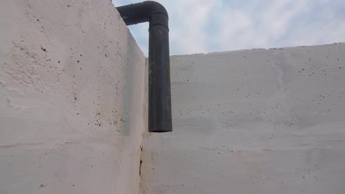Pipe at Corner of Storage Basin for Treated Water Supply
