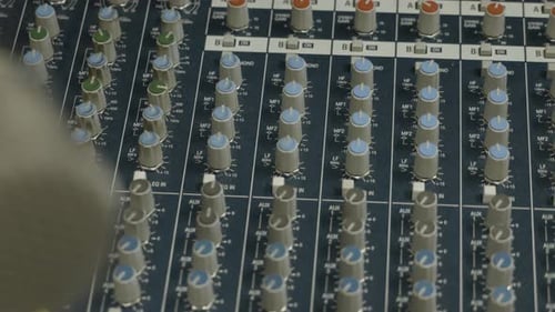 Close up of a professional Audio sound mixer in a recording studio