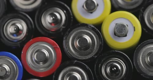 Collection of Colorful Batteries Close Up, Dolly Shot