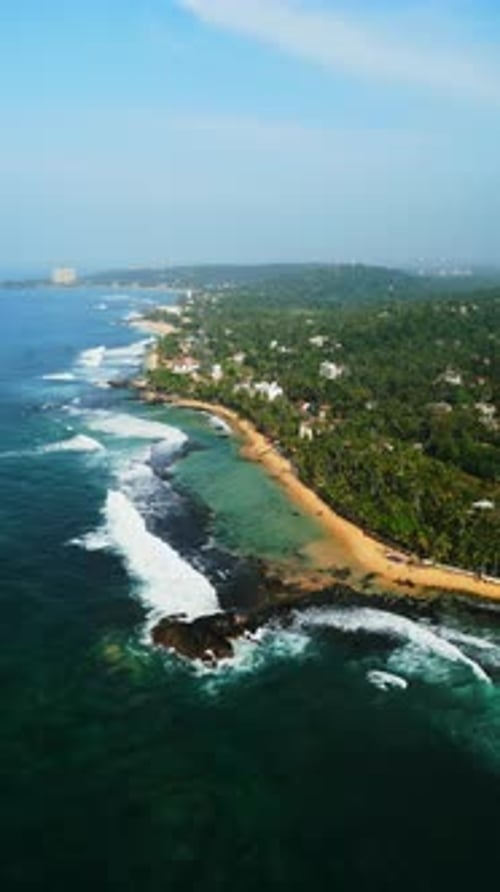 Aerial View of Dalawella Beach Lagoon in Sri Lanka Turquoise Waters Sandy Shores Fringed By Lush