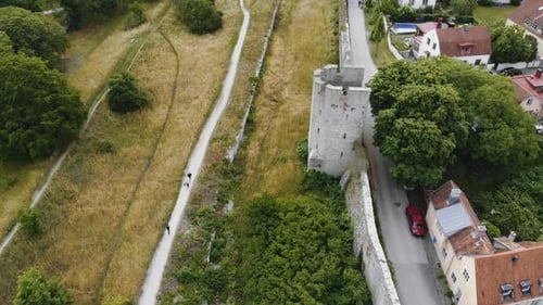 Aerial flying forward over Visby city wall. Gotland, Sweden