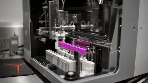 Blood Analysis Machine Takes Samples for Testing