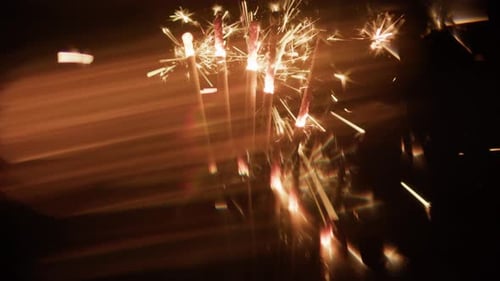 Sparklers Burning and Emitting Bright Shimmering Light