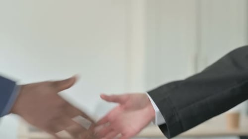 Close Up of Young Business People Shaking Hand Collaboration