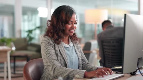 Woman, typing and computer in office with smile for review, editing and reading article