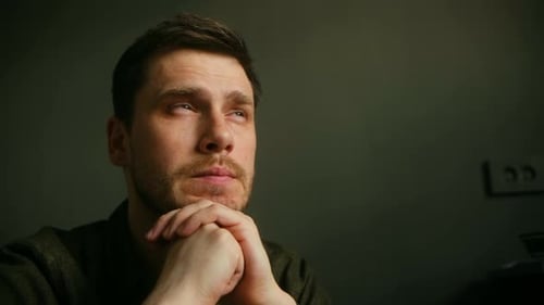 Man Looking Upwards in Thoughtful Contemplation