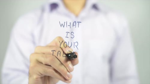Man Writing on Screen Asks About Talent