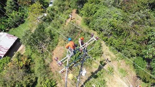 Electrical workers, maintaining power lines