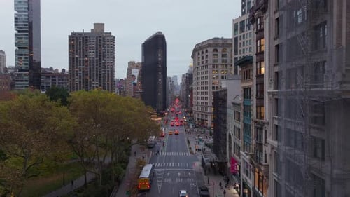 Traffic Flows Smoothly Along 5Th Avenue and Flatiron District Flanked By Tall Buildings and Madison