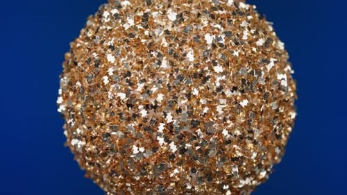 Goldene Glitzerkugel-Textur