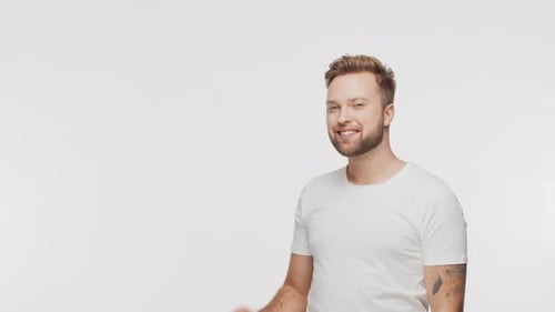 Expressive Young Man Over Vibrant Background Studio Portrait of Handsome Person