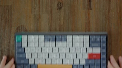 Mechanical Keyboard Placed on Wooden Tabletop