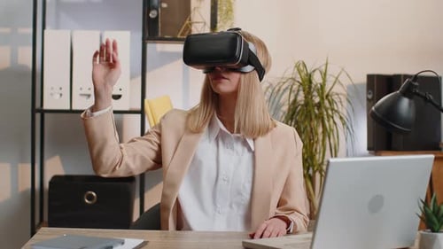 Woman Using Virtual Reality Headset in Office