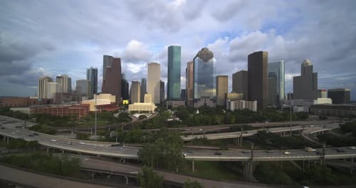 Ascending wide angle drone shot of buildings in downtown Houston, Texas