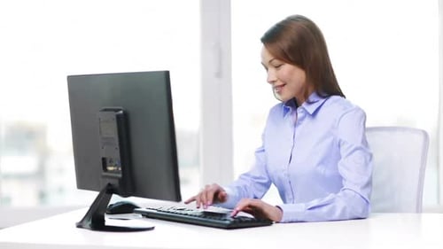 Business, Office, School and Education Concept - Smiling Businesswoman with Computer In