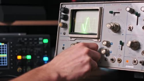 Adjusting Vintage Oscilloscope