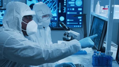 Scientists Working in Advanced Medical Research Laboratory