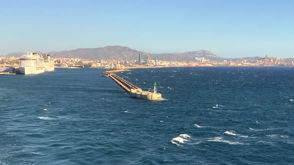 the rear view of a large ship leaving the port of Marseille, Holidays ...