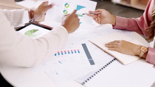 Business people, hands and analytics on table for data, information or corporate statistics