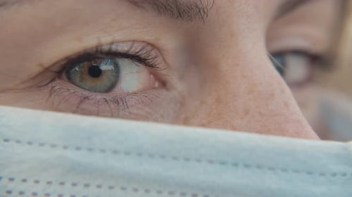 Close-Up Portrait of Modern Casual Young One Woman Wearing Protective Medical Face