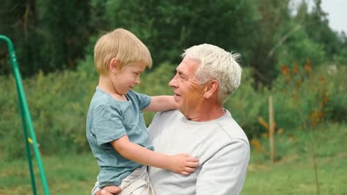 Grandfather and Grandchild Baby Have Fun During Walk In Park Happy Family Time Old Man Grandpa