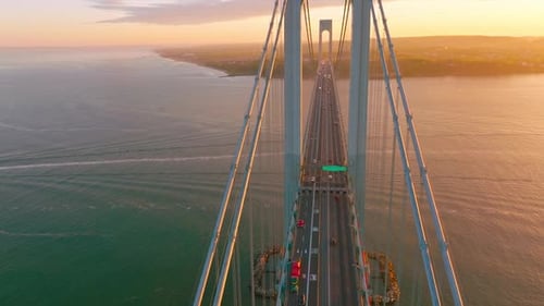 Beautiful bridge with motorways for transport. Top view. Huge structure over the river