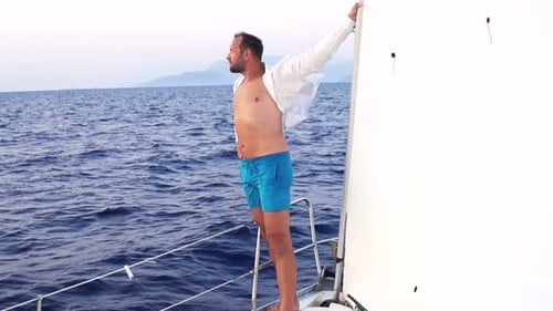 Pensive Man Admire View While Sailing Boat on Sea 30s
