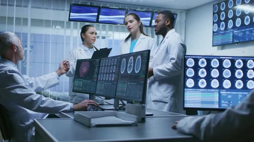 Medical Team Discusses Brain Scans in Modern Hospital
