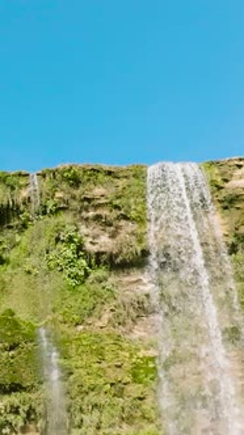 A Tropical Waterfall in a Mountain Canyon