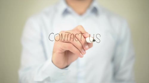 Contact Us Message Written on Clear Surface