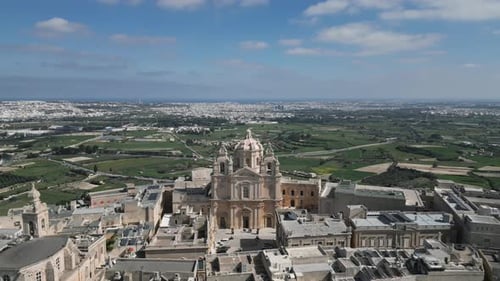 Aerial video of the walled city of St Paul's Cathedral, Malta