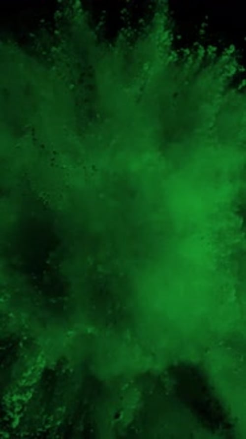 Super Slow Motion Shot of Green Color Powder Explosion at 1000Fps Vertical View