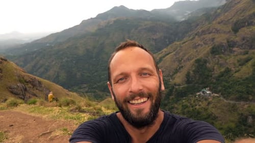 Happy Man Taking Selfie, Recording Video with Valley View, Super