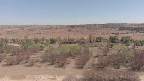 aerial shot over a dry river