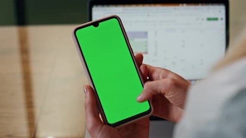 Woman Swiping Phone Mockup at Office Table
