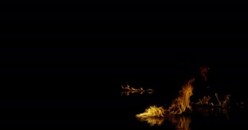 Ignite Collection: Front view of tiny fire waves transforming into big ones as they float on water o