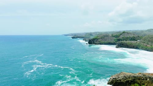 Aerial footage of beautiful beach scenery in Yogyakarta, Indonesia