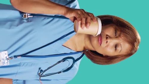 Nurse Tasting Instant Coffee at Work