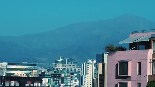 Wide shot static view of buildings in downtown Santiago de Chile shallow depth of field Los Andes mo
