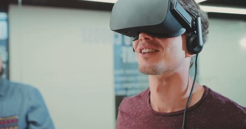 NEW YORK April 5 2017Two Handsome Caucasian Men Standing Near Table in Office Young Cute Guy Testing