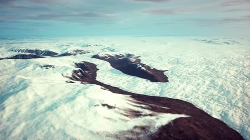 A Breathtaking Snowcovered Mountain Range Seen From Above