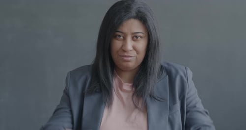 Woman Giving Thumbs Down Gesture