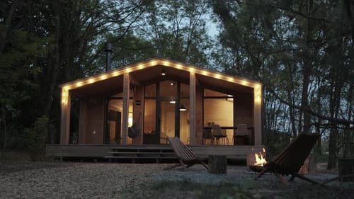 Cozy Cabin Retreat in the Peaceful Forest at Night