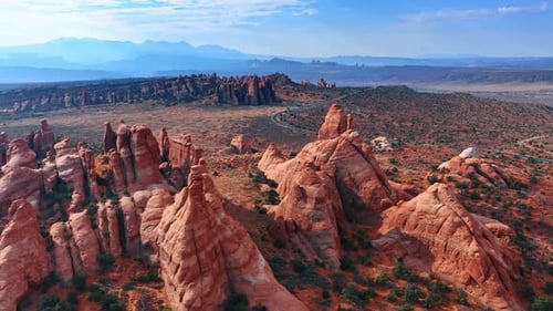 Unusual bare red rocks sharpened by the wind. Arches National Park, Utah, USA. Aerial view.