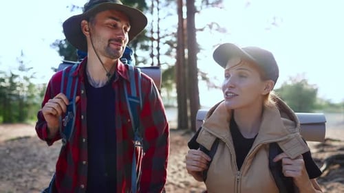 Happy Couple Hiking Together Outdoors